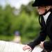A girl pets her horse during the Washtenaw County 4-H Youth Show on Sunday, July 28. Daniel Brenner I AnnArbor.com
